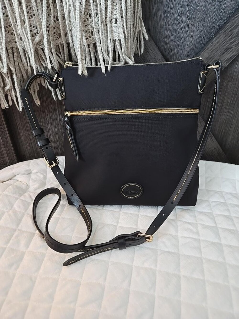 Dooney & Bourke Black Nylon Crossbody Bag with Gold Hardware and Red Interior